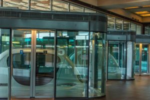 Automatic sliding door at a commercial property highlighting safety compliance and legal risk considerations.